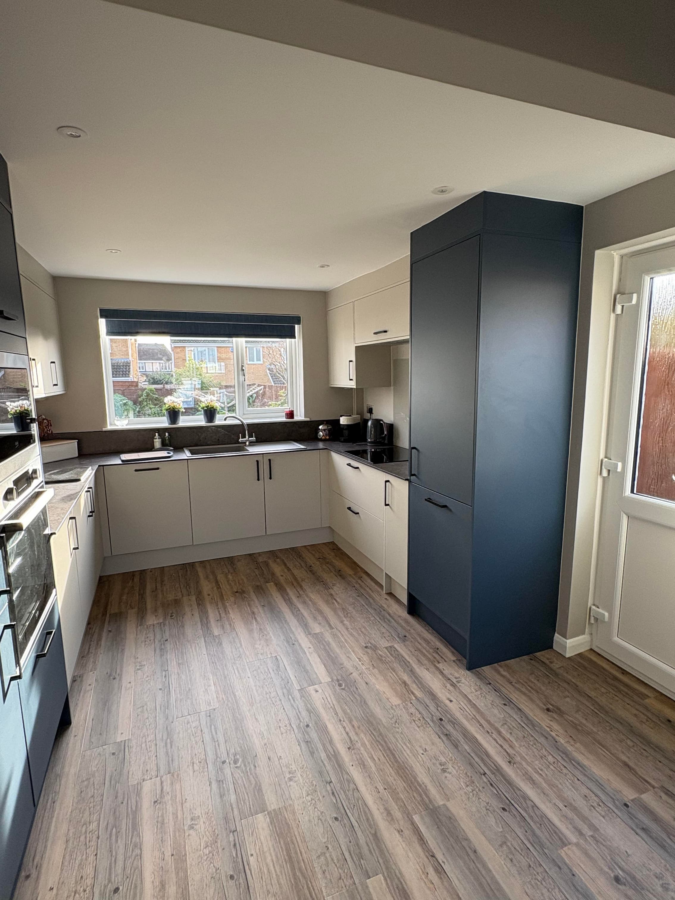 Open plan kitchen conversion fitted by Home Converters in Kingsthorpe, Northampton